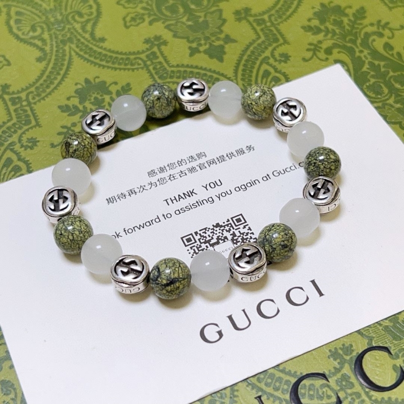G*u*i bracelets